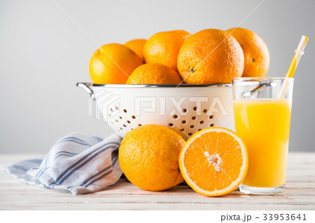 Fresh oranges in a colander 33953641