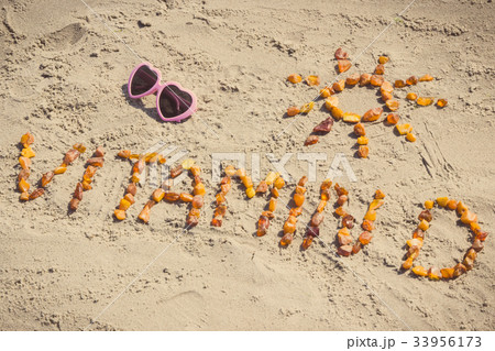 Inscription vitamin D with shape of sun 33956173