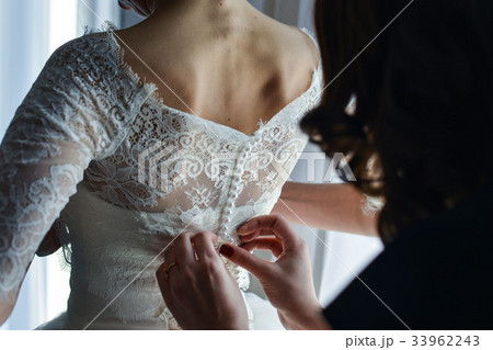 Garter on the leg of a bride, Wedding day moments 33962243