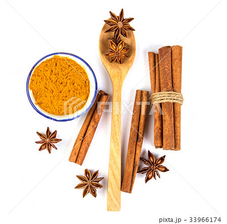brown cinnamon stick and powder with star anise brown cinnamon stick and powder with star anise 33966174
