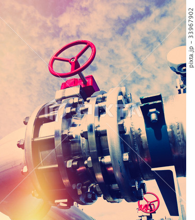 Steel pipelines and valves against blue sky Steel pipelines and valves against blue sky 33967902