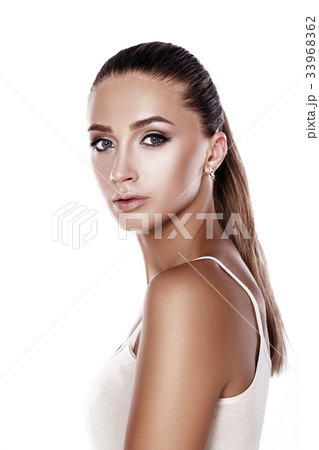 portrait of a beautiful tanned brunette woman with 33968362