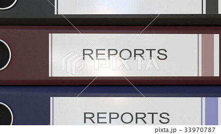 Vertical stack of multicolor office binders with Vertical stack of multicolor office binders with 33970787