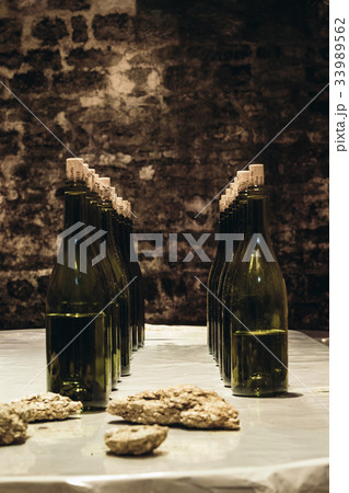Wine bottles on the table 33989562