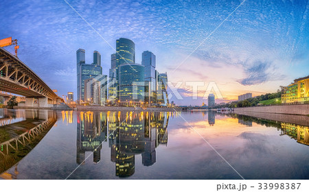 Moscow city district reflecting in Moskva river Moscow city district reflecting in Moskva river 33998387