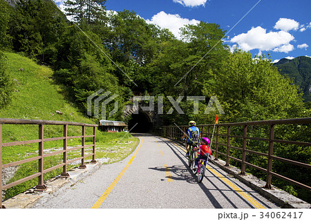 Father and daughter going in bicycle 34062417