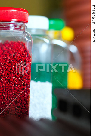Multicolored granules in cans Multicolored granules in cans 34066322