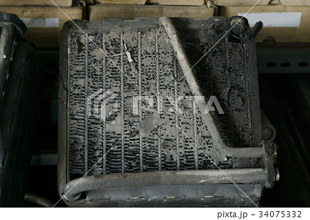 Used engine air filler for car is so dirty. 34075332