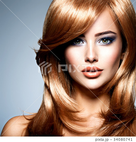 Beautiful woman with long red hairs with makeup Beautiful woman with long red hairs with makeup 34080741