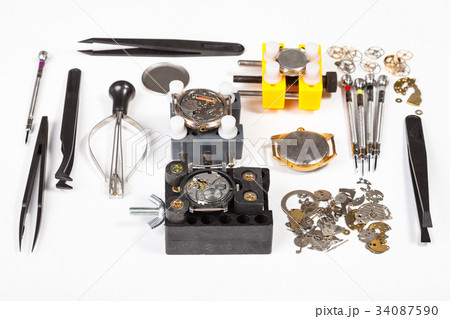 watch repairing tools on white 34087590