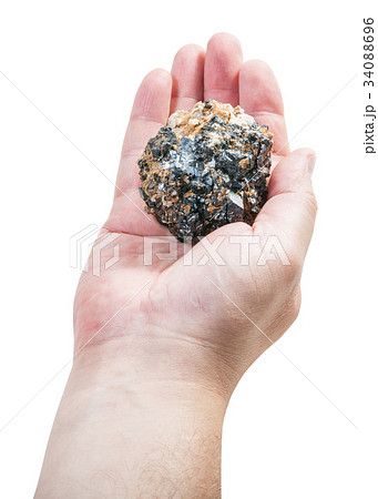 above view of zinc and lead ore on male palm 34088696