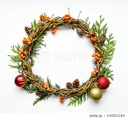 Christmas wreath with decor, berries. Flat lay Christmas wreath with decor, berries. Flat lay 34092284