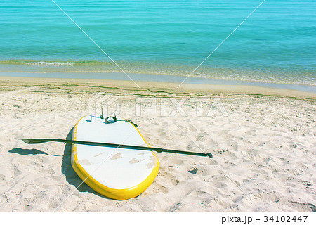 sup board by the sea 34102447