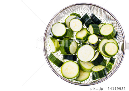 Young zucchini, cut into slices Young zucchini, cut into slices 34119983