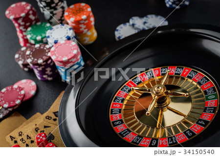 Roulette wheel gambling in a casino table. Roulette wheel gambling in a casino table. 34150540