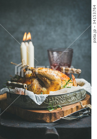 Christmas table set with roasted whole chicken 34153764