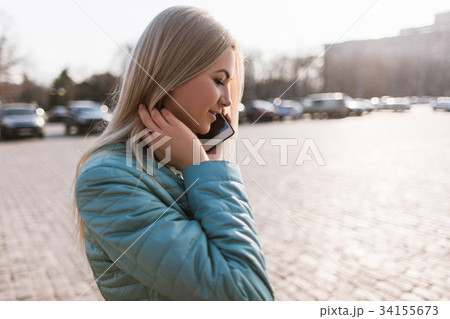 Telecommunications in big city. Girl on street 34155673
