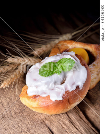 Various types of bread on wooden 34156930