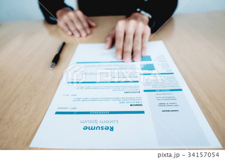 Businessman and resume. 34157054