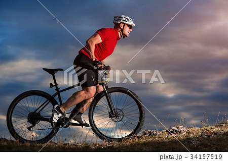 Bike adventure travel photo. Bike tourists ride on Bike adventure travel photo. Bike tourists ride on 34157519