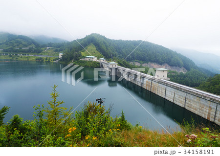 【標高日本一の多目的ダム】琴川ダム（乙女湖）えん堤と湖面 34158191