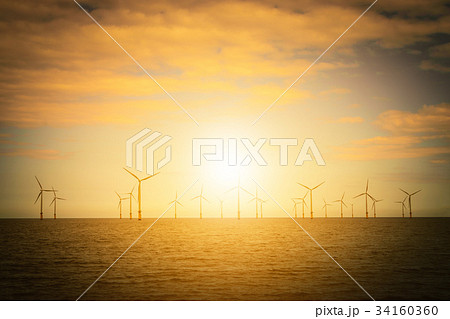Sunset Offshore Wind Turbine in a Wind farm 34160360