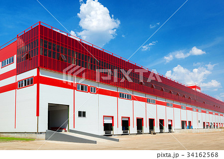 Warehouse on a background of blue sky 34162568