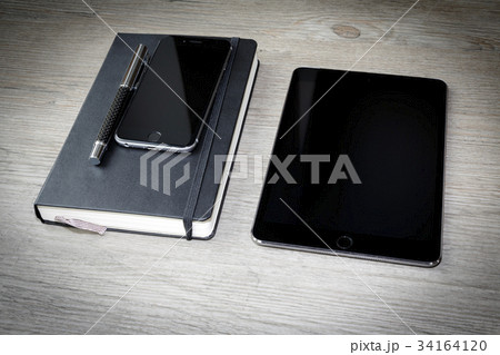 calendar or diary with pen, smarthphone and 34164120