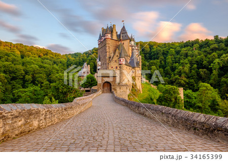 Burg Eltz castle in Rhineland-Palatinate at sunset Burg Eltz castle in Rhineland-Palatinate at sunset 34165399