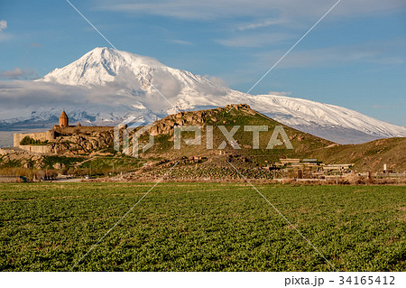 Ancient monastery in front of mountain Ancient monastery in front of mountain 34165412