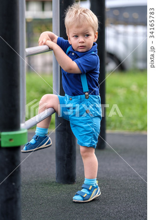 Toddler boy at playground Toddler boy at playground 34165783