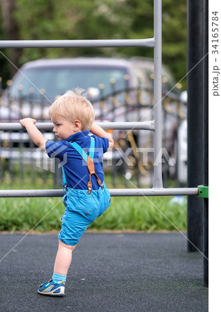Toddler boy at playground  34165784