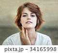 Beautiful young girl smiling 34165998