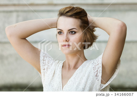 Beautiful girl in white summer dress Beautiful girl in white summer dress 34166007