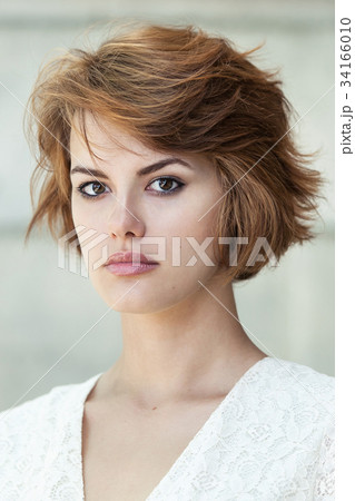 Portrait of beautiful young girl 34166010