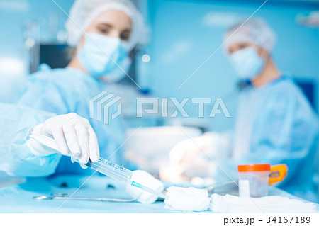 Close up of female hand that taking medical Close up of female hand that taking medical 34167189