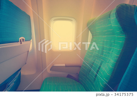 Airplane seat with in cabin of huge aircraft Airplane seat with in cabin of huge aircraft 34175375