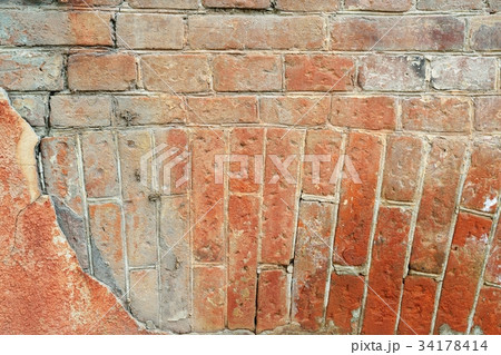 Old cracked concrete vintage brick wall background 34178414