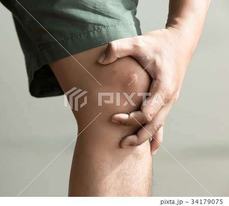the knee man holds on suffering from pain in knee the knee man holds on suffering from pain in knee 34179075