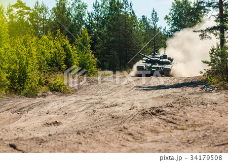 heavy battle tank attacks on the ground  34179508
