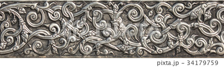 Pattern of silver metal plate with flower carved 34179759