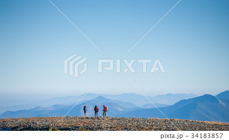 Group tourists enjoying the view on the rocky mountain plato 34183857