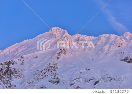Beautiful view of mountain peak with sunrise light 34186279