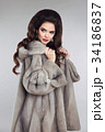 fashionable woman in mink fur coat. gorgeous 34186837