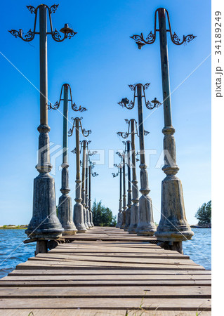 The wood pier and the light posts decoration 34189249