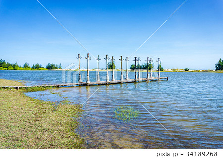 Wood pier and light posts Wood pier and light posts 34189268