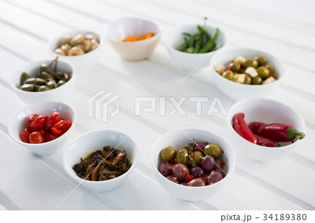 Marinated olives with bread pieces and olive oil Marinated olives with bread pieces and olive oil 34189380