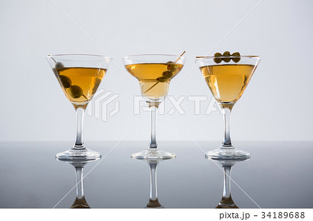 Marinated olives with green leaves in plate Marinated olives with green leaves in plate 34189688
