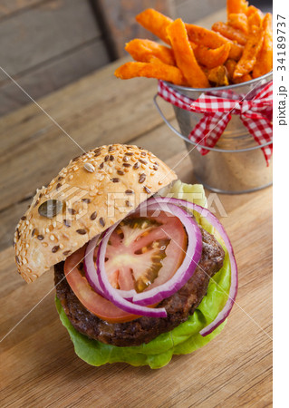 Close-up of hamburger in paper bag 34189737