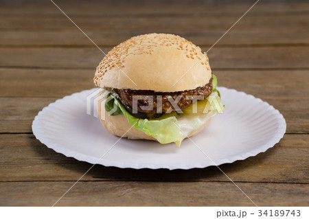 Hamburger, french fries and cold drink on table 34189743